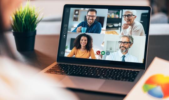 Doctor on video call with colleagues